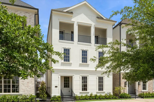 a front view of a multi story residential apartment building