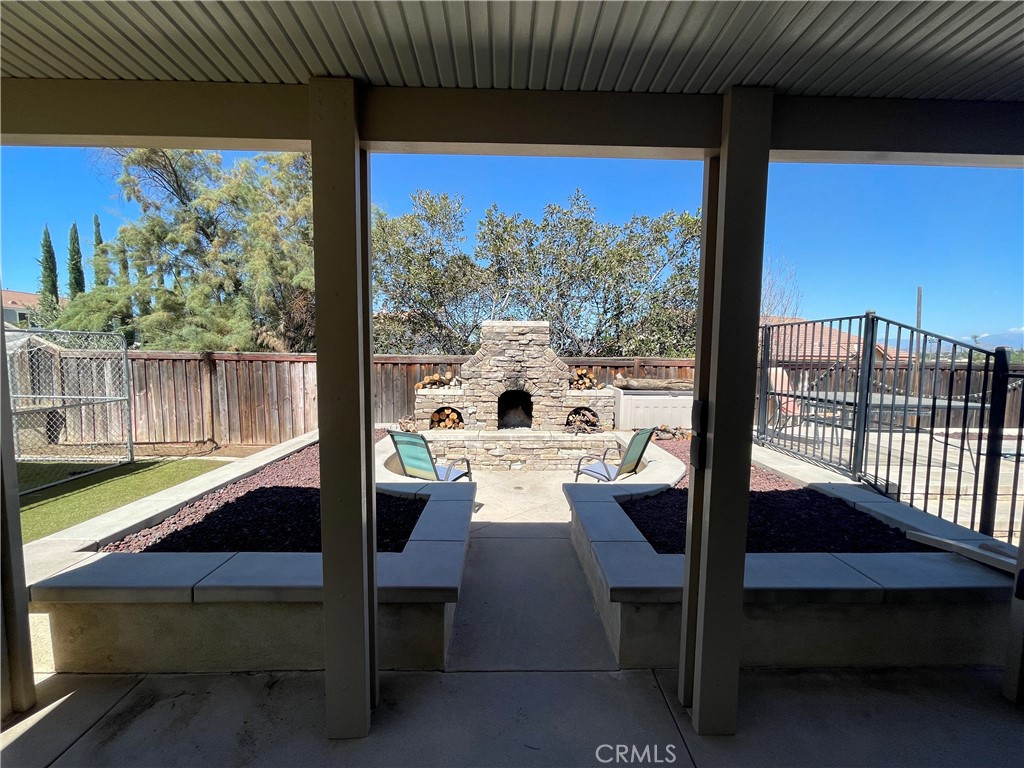 18668 Alderbrook Drive Riverside, CA 92508 - Photo 16 of 28 a view of a balcony with chairs and a table
