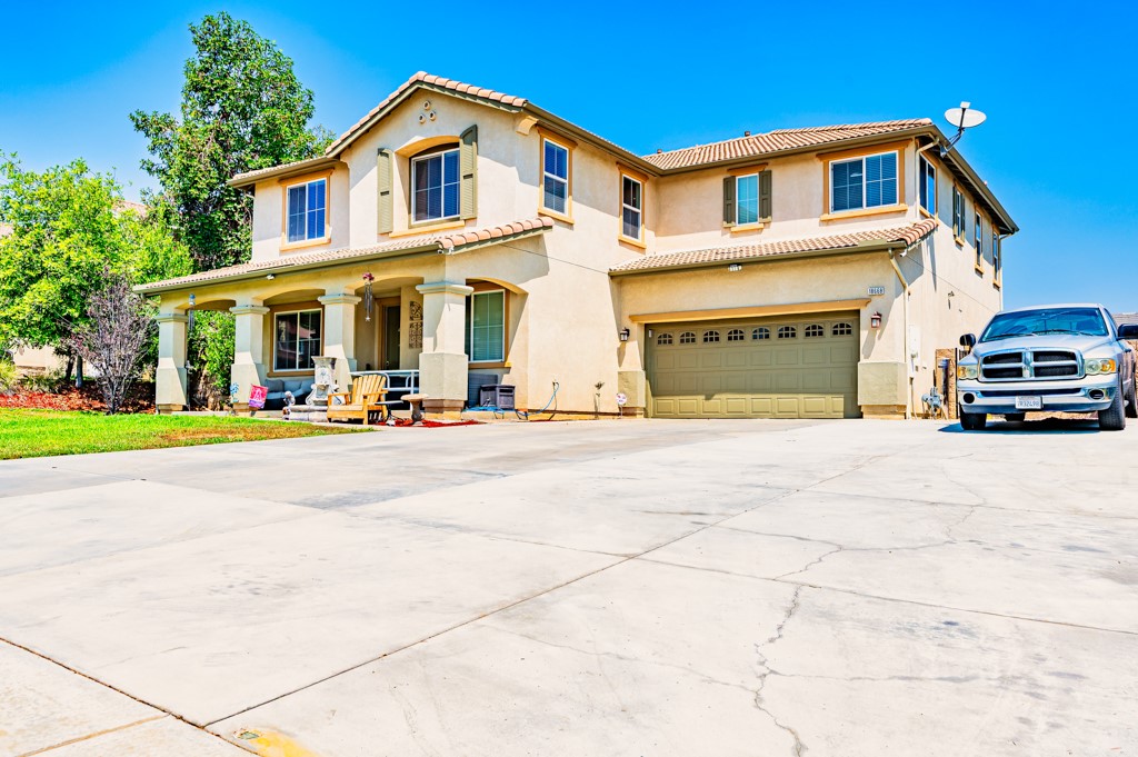 18668 Alderbrook Drive Riverside, CA 92508 - Photo 23 of 28 a view of building with cars parked