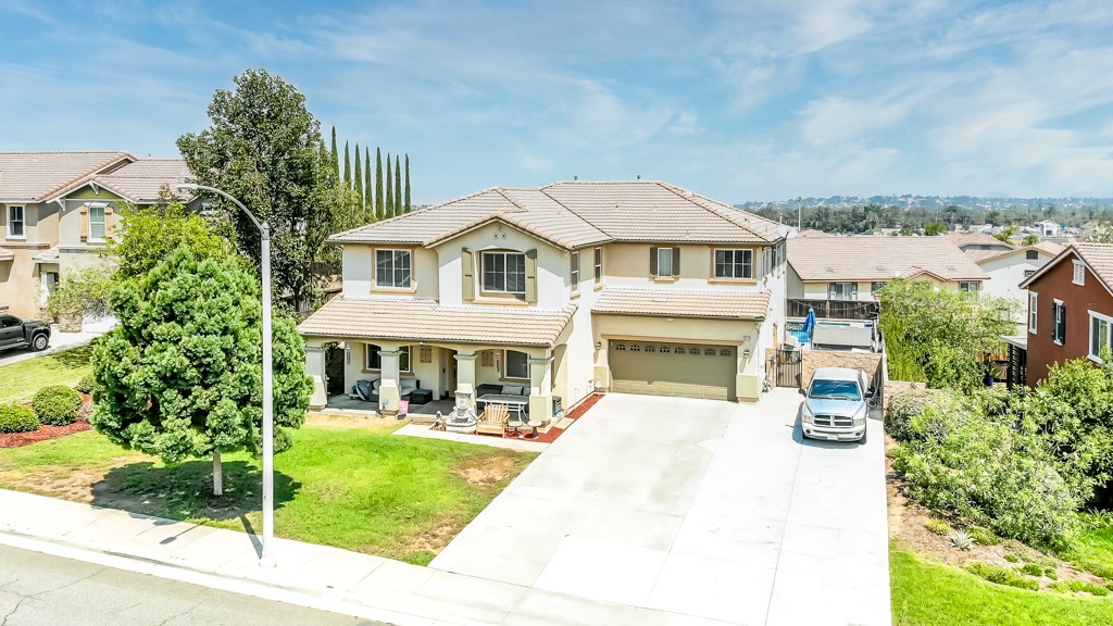 18668 Alderbrook Drive Riverside, CA 92508 - Photo 26 of 28 a front view of a house with a yard