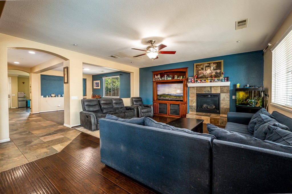 18668 Alderbrook Drive Riverside, CA 92508 - Photo 9 of 28 a living room with furniture and a fireplace