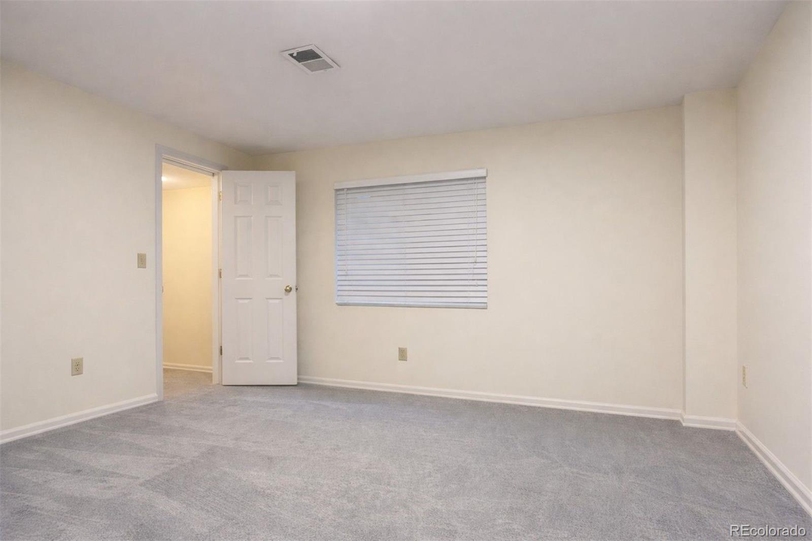 9471 Burlington Lane Highlands Ranch, CO 80130 - Photo 37 of 50 a view of an empty room with a window