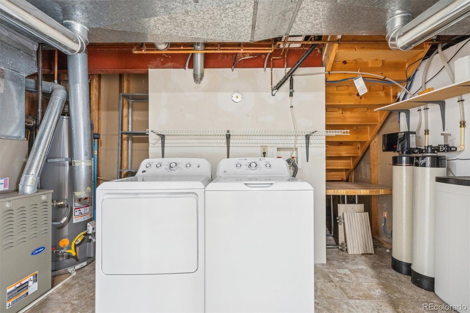 9471 Burlington Lane Highlands Ranch, CO 80130 - Photo 38 of 50 a utility room with dryer and washer