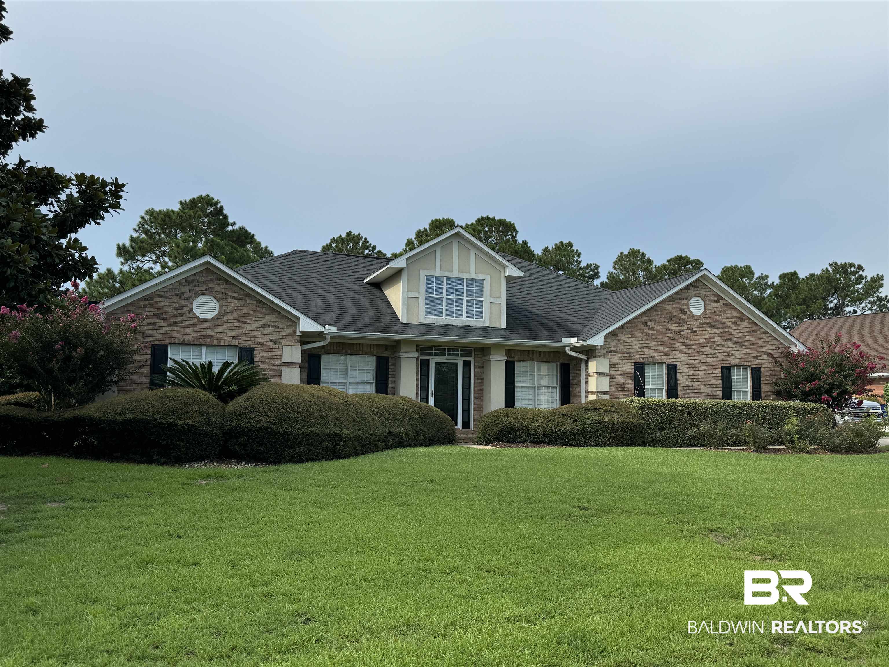9139 Clubhouse Drive Foley, AL 36535 - Photo 1 of 30 View of front facade with a front lawn