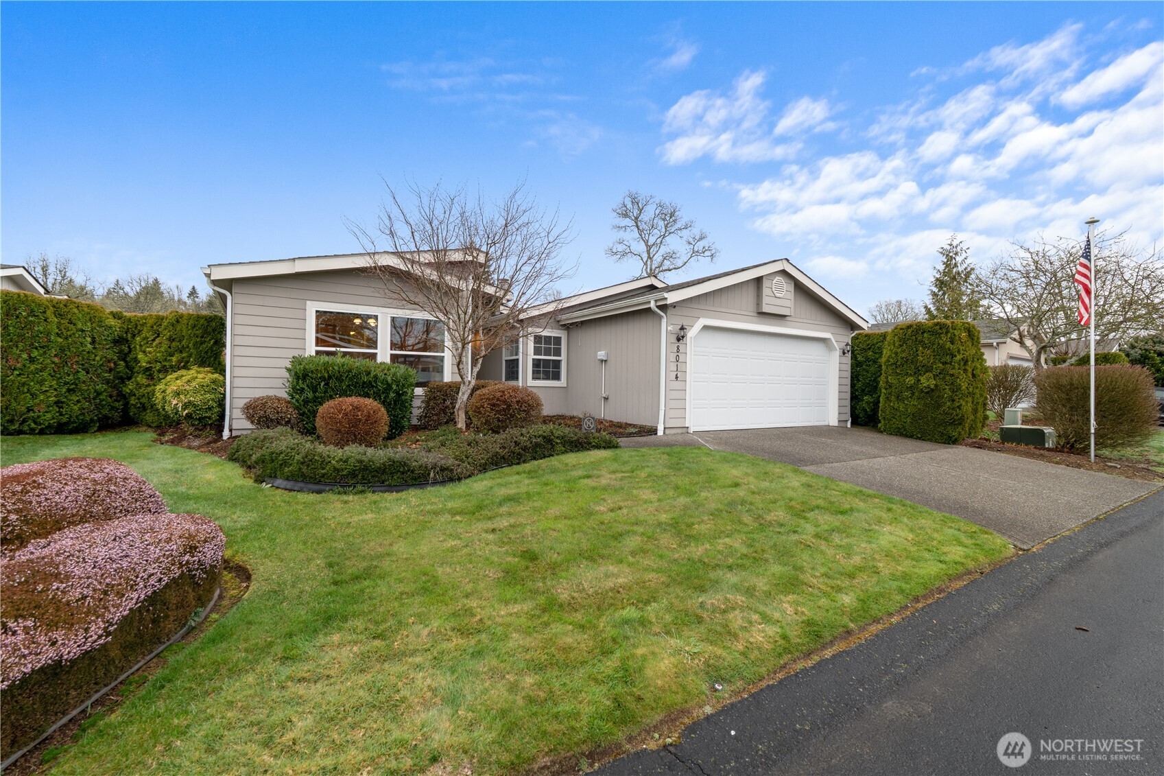 8014 18th Lane Southeast Lacey, WA 98503 - Photo 1 of 32 a view of a house with backyard and garden