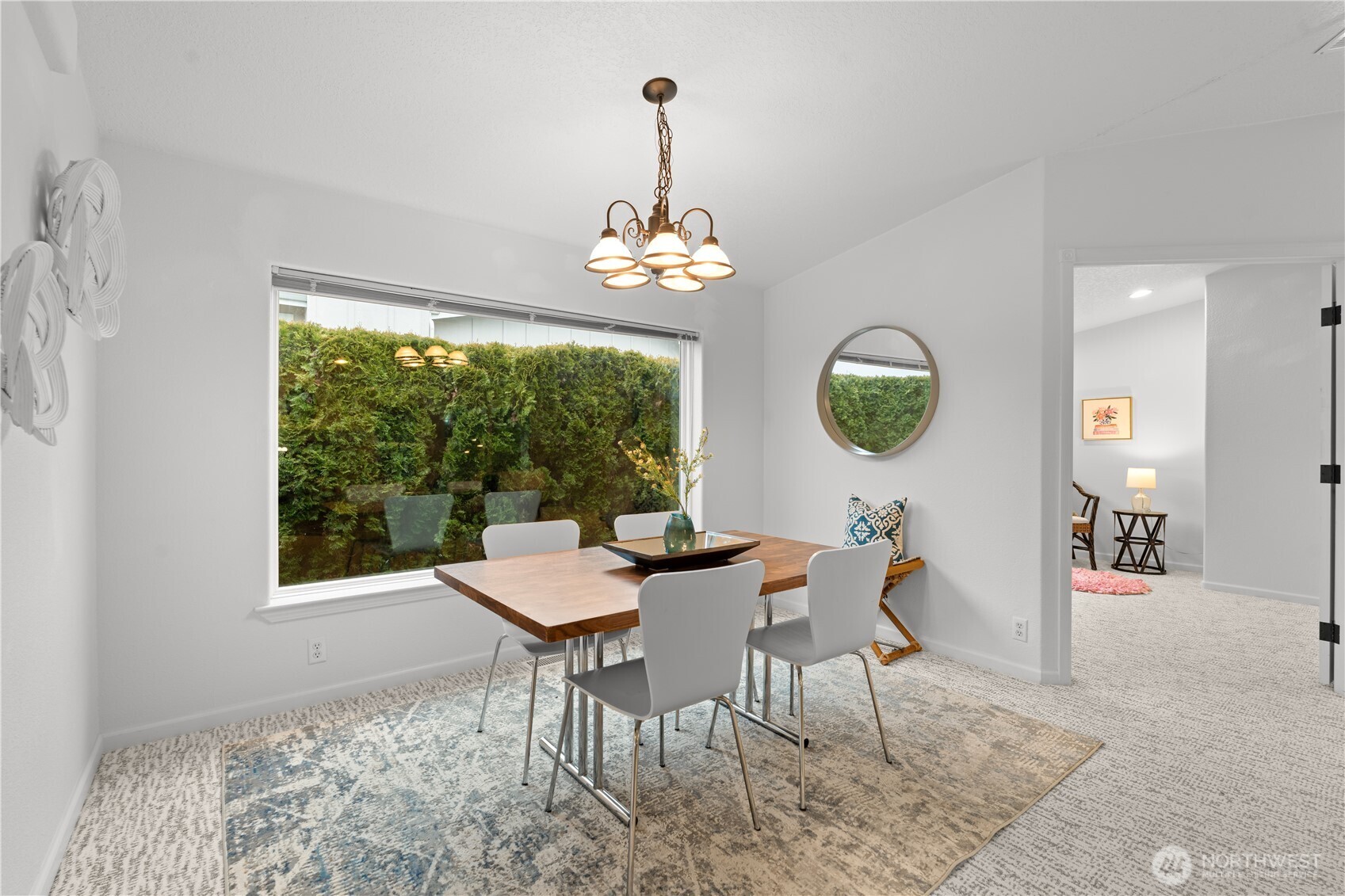 8014 18th Lane Southeast Lacey, WA 98503 - Photo 11 of 32 a view of a dining room with furniture window and wooden floor