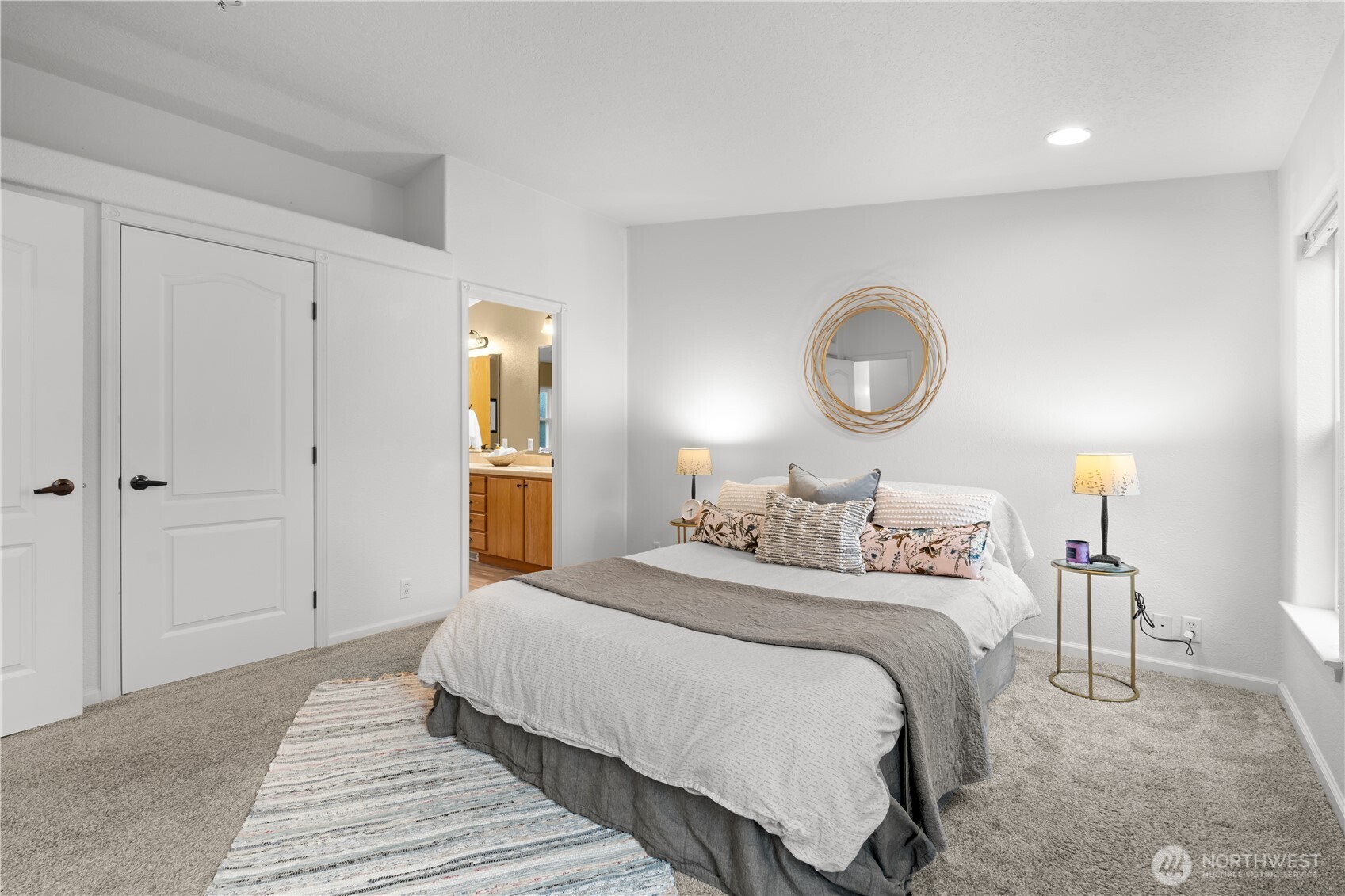 8014 18th Lane Southeast Lacey, WA 98503 - Photo 18 of 32 a bedroom with a bed and a lamp