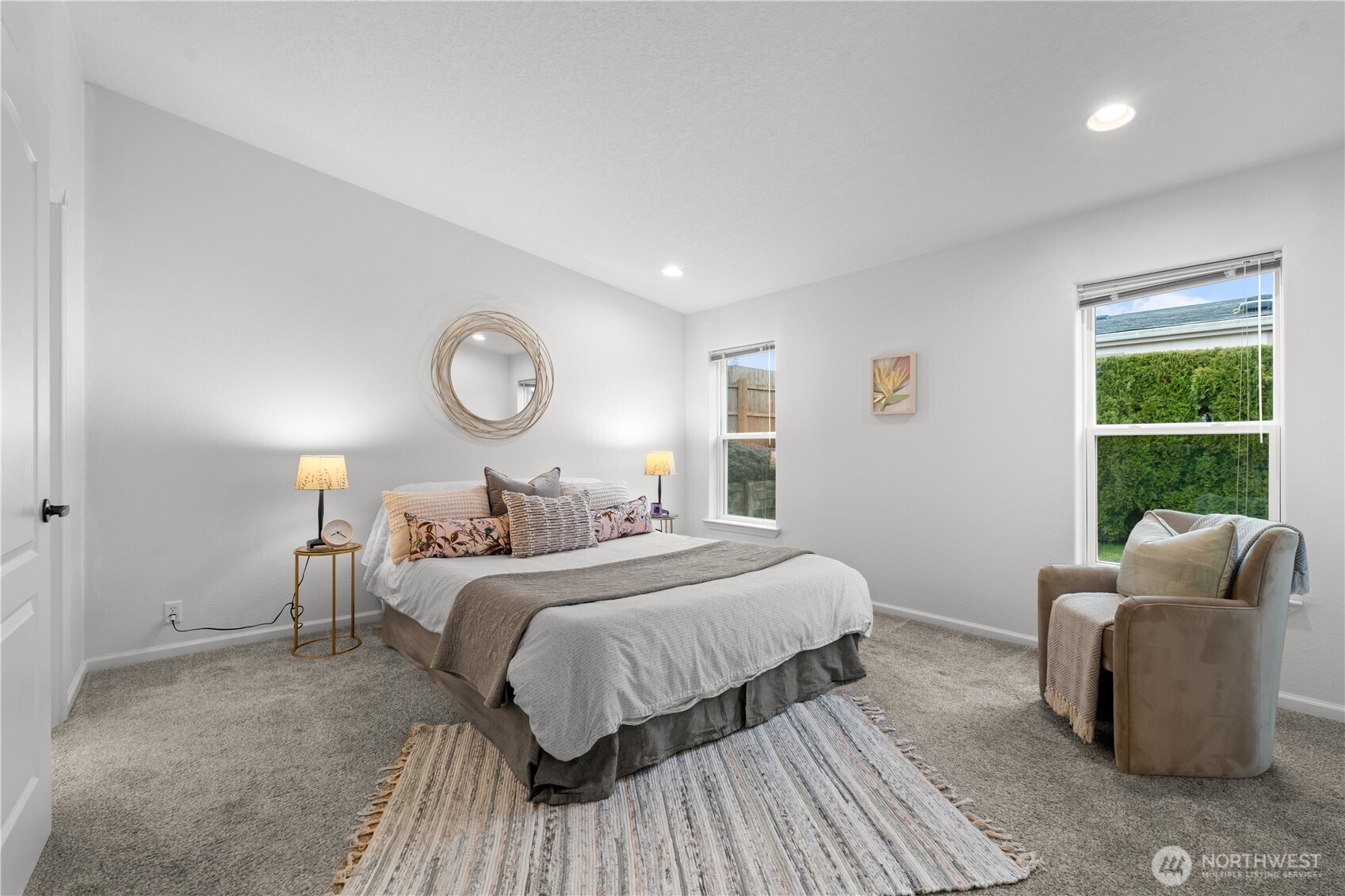 8014 18th Lane Southeast Lacey, WA 98503 - Photo 19 of 32 a bedroom with a bed and a couch