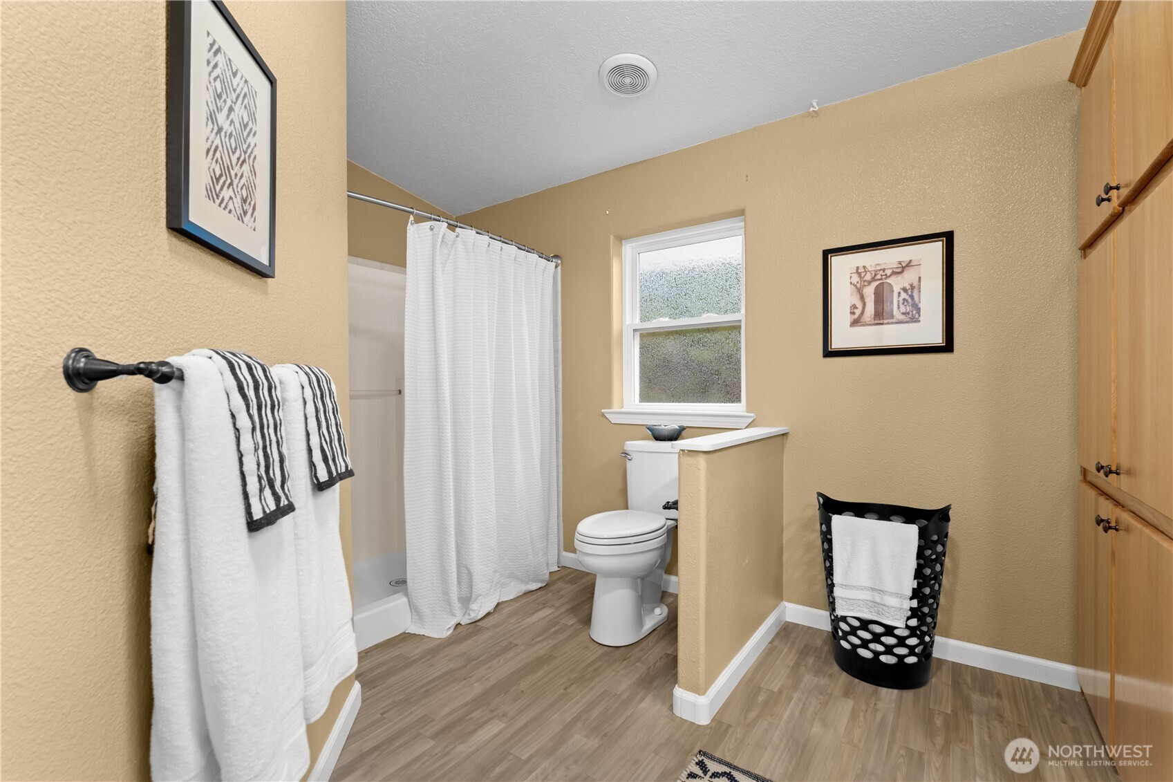8014 18th Lane Southeast Lacey, WA 98503 - Photo 22 of 32 a bathroom with a toilet and a shower