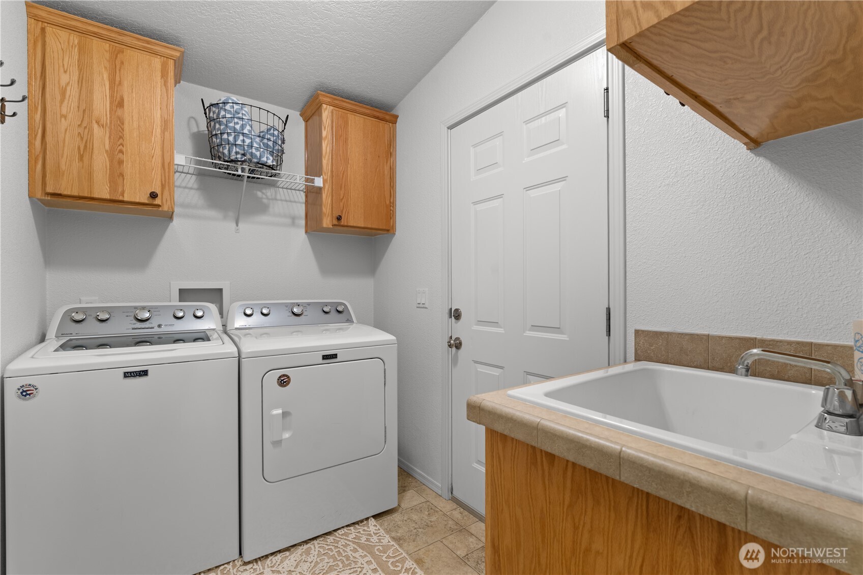 8014 18th Lane Southeast Lacey, WA 98503 - Photo 30 of 32 a utility room with dryer and washer