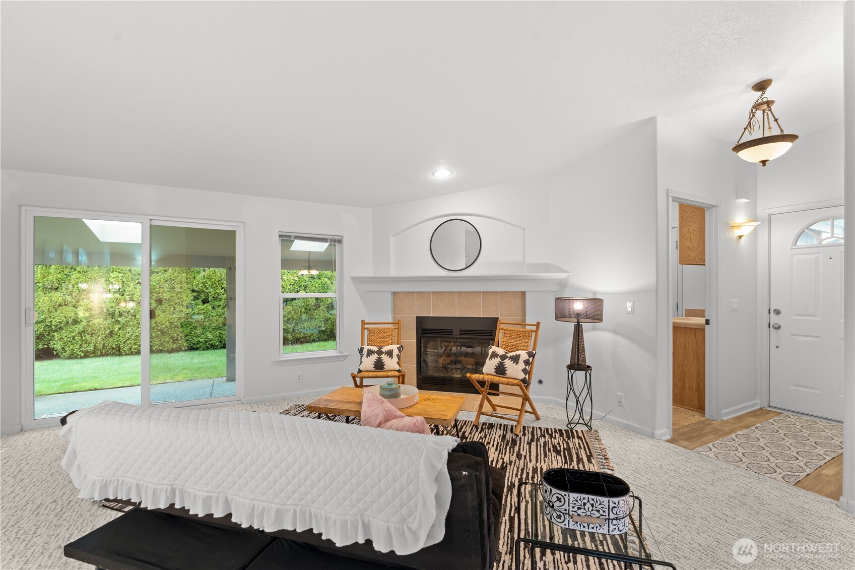 8014 18th Lane Southeast Lacey, WA 98503 - Photo 5 of 32 a bed room with a bed and a fireplace