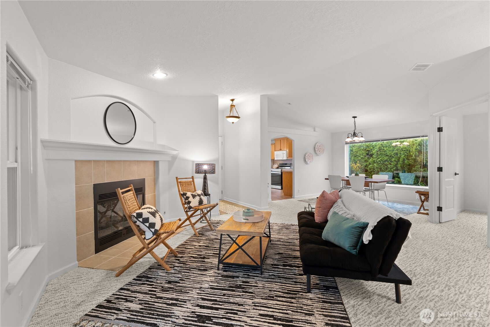 8014 18th Lane Southeast Lacey, WA 98503 - Photo 6 of 32 a living room with furniture and a fireplace