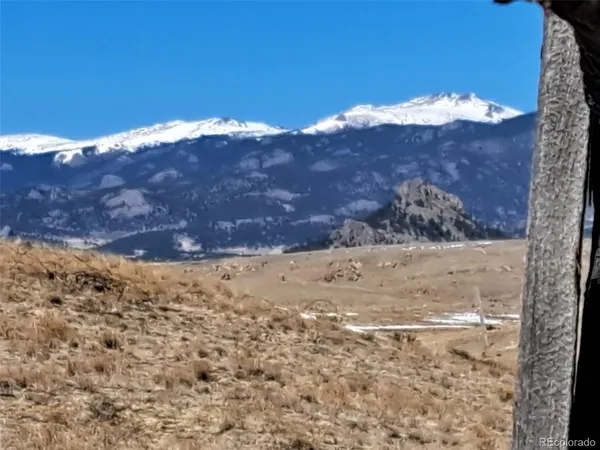 a view of a yard with mountain view