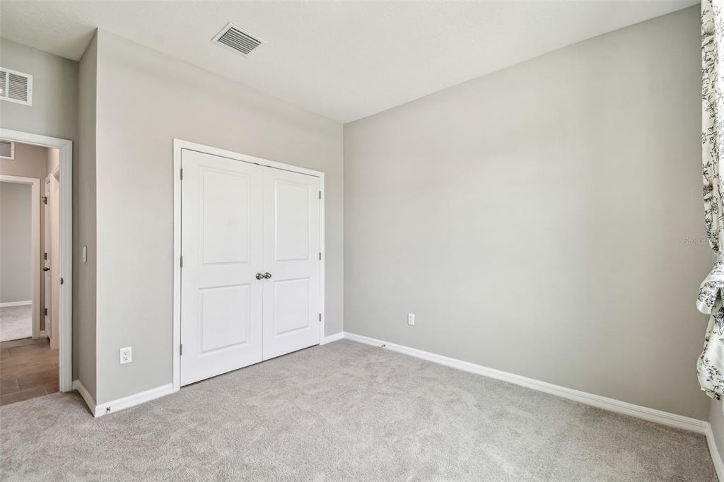 33870 Field Maple Loop Wesley Chapel, FL 33545 - Photo 12 of 38 a view of an empty room