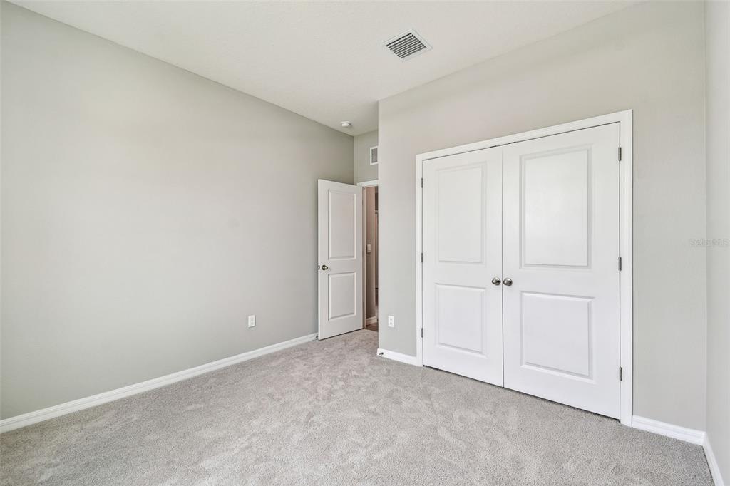 33870 Field Maple Loop Wesley Chapel, FL 33545 - Photo 15 of 38 a view of an empty room