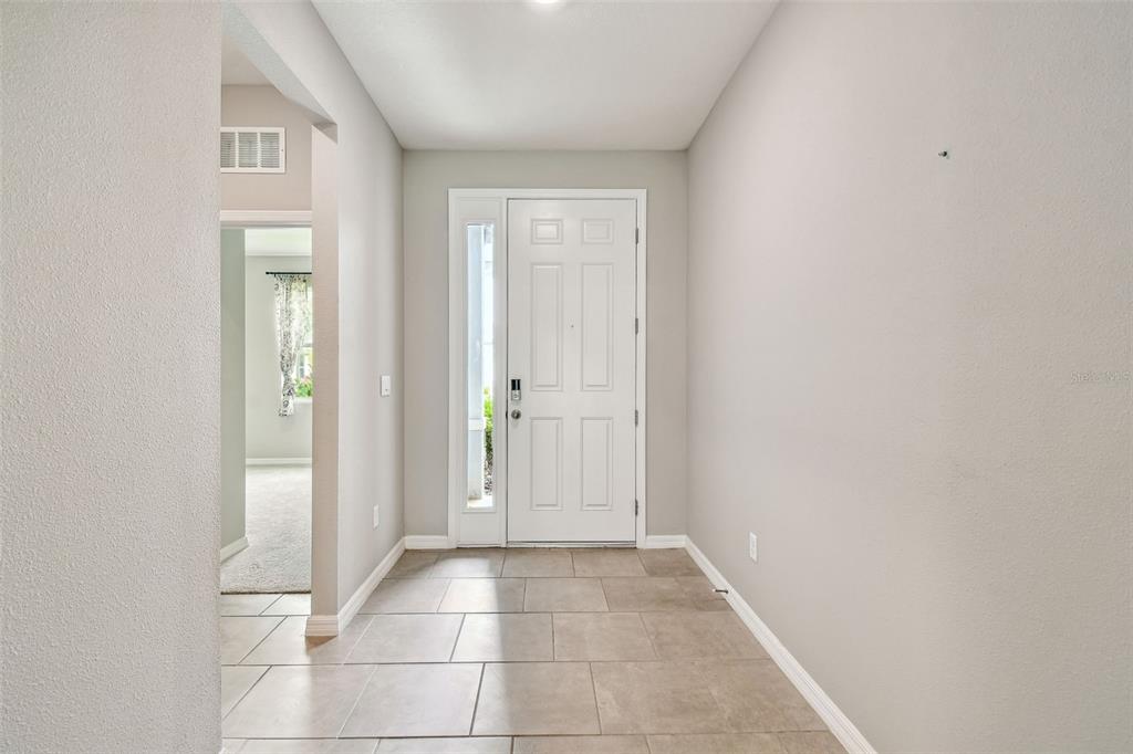 33870 Field Maple Loop Wesley Chapel, FL 33545 - Photo 10 of 38 a view of an empty room