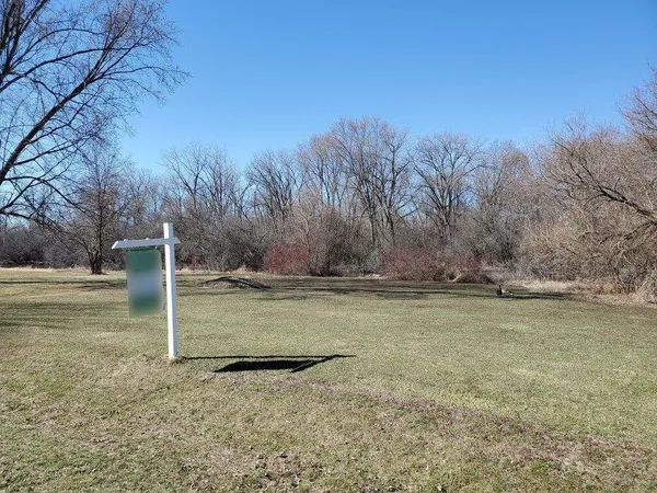 a view of a yard with an outdoor space
