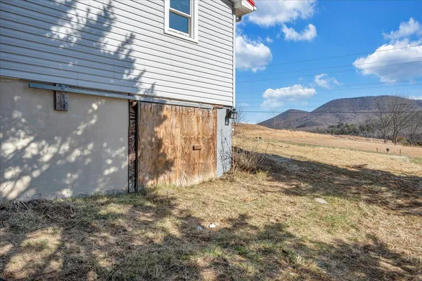 a view of a yard with an outdoor space