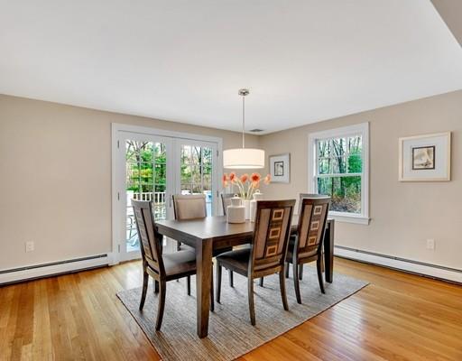 219 Sandy Pond Road Lincoln, MA 01773 - Photo 20 of 26 a view of a dining room with furniture window and wooden floor