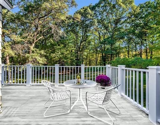 219 Sandy Pond Road Lincoln, MA 01773 - Photo 21 of 26 a view of a chairs and table on the wooden floor