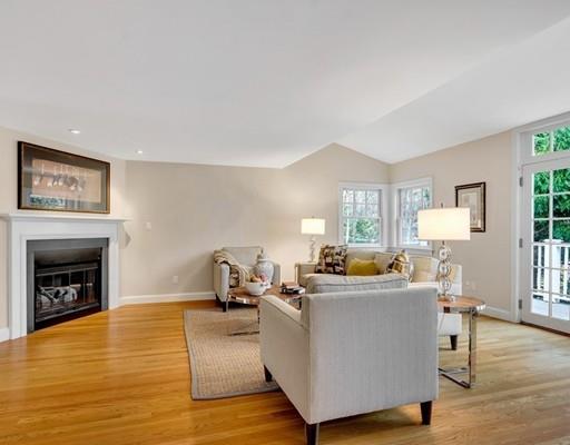 219 Sandy Pond Road Lincoln, MA 01773 - Photo 8 of 26 a living room with furniture and a fireplace