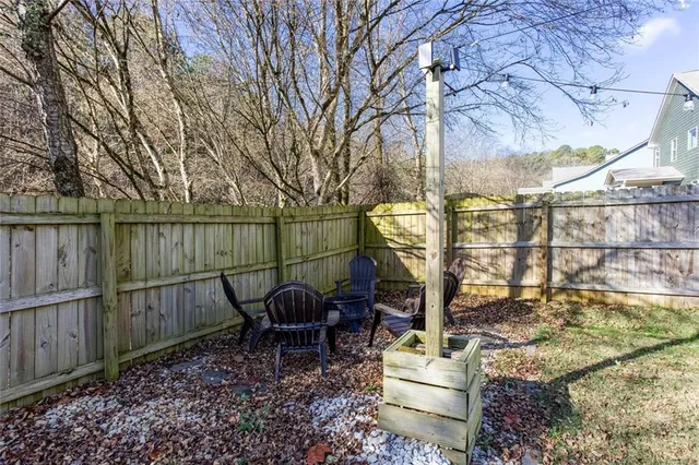 a view of a garage with rack and bicycle