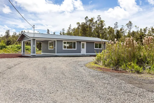 front view of house with a yard
