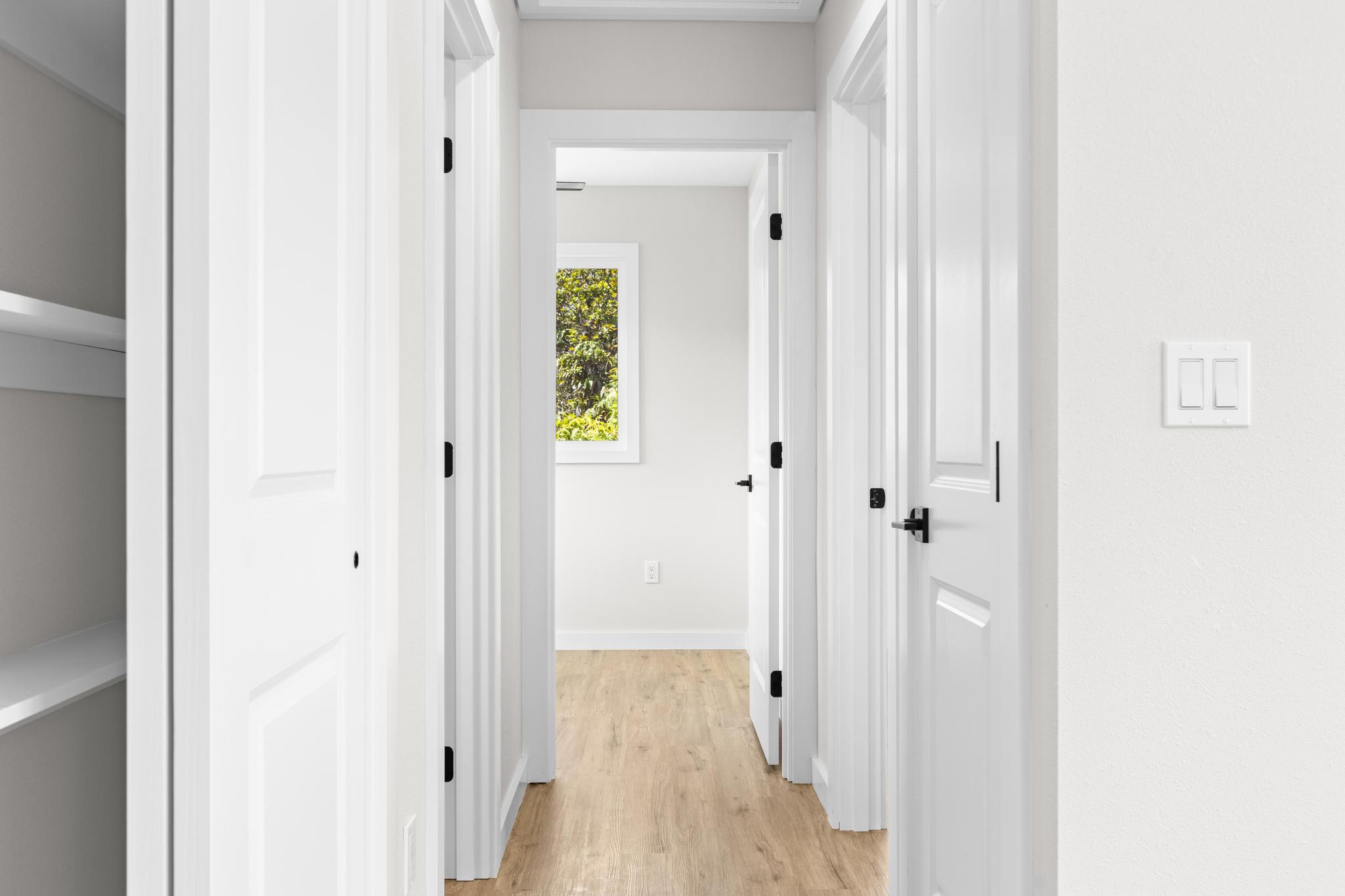 11-3116-a Mokuna Street Mountain View, HI 96771 - Photo 15 of 15 a view of a hallway with wooden floor
