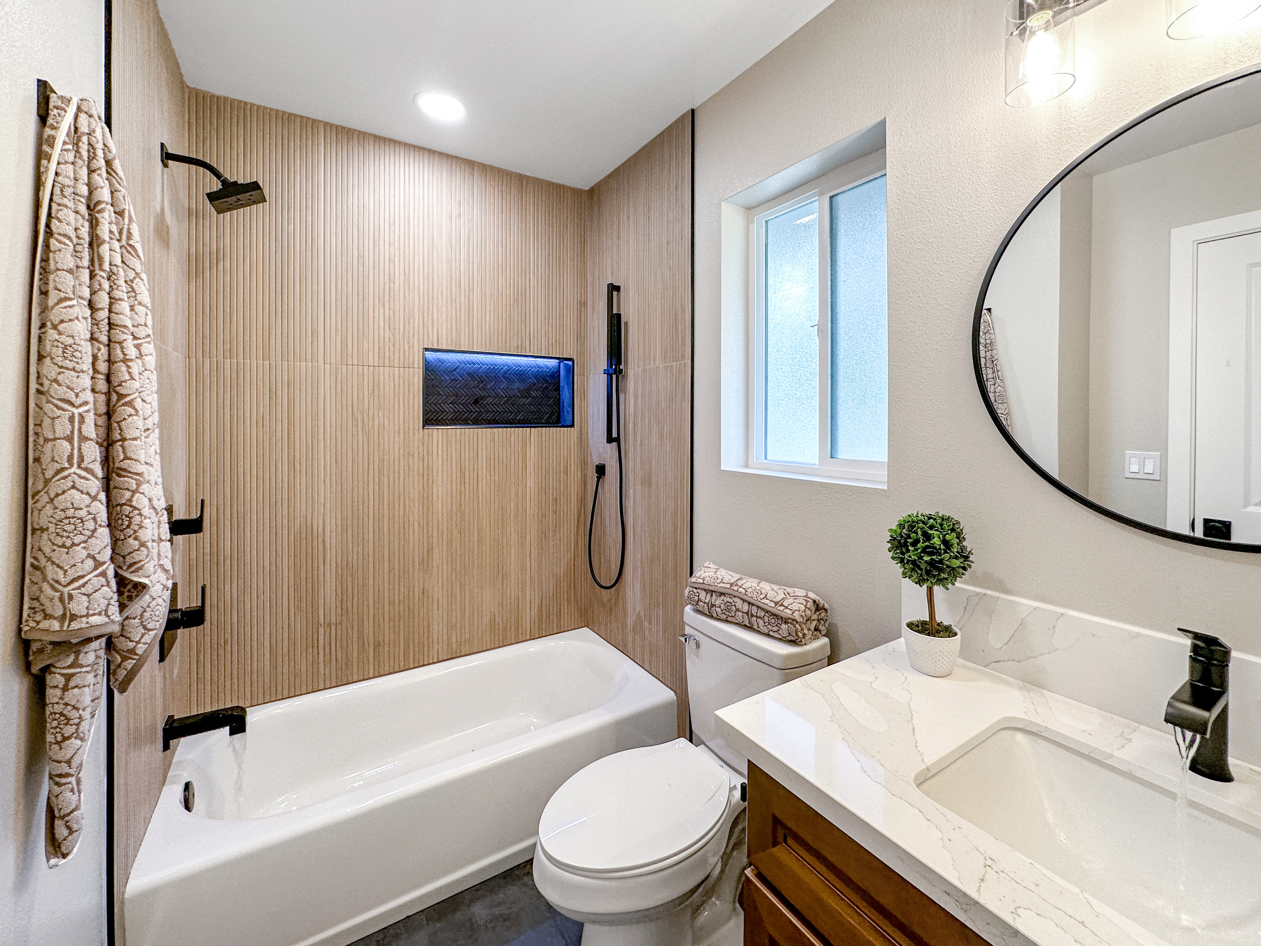 11-3116-a Mokuna Street Mountain View, HI 96771 - Photo 3 of 15 a bathroom with a sink a toilet and a mirror