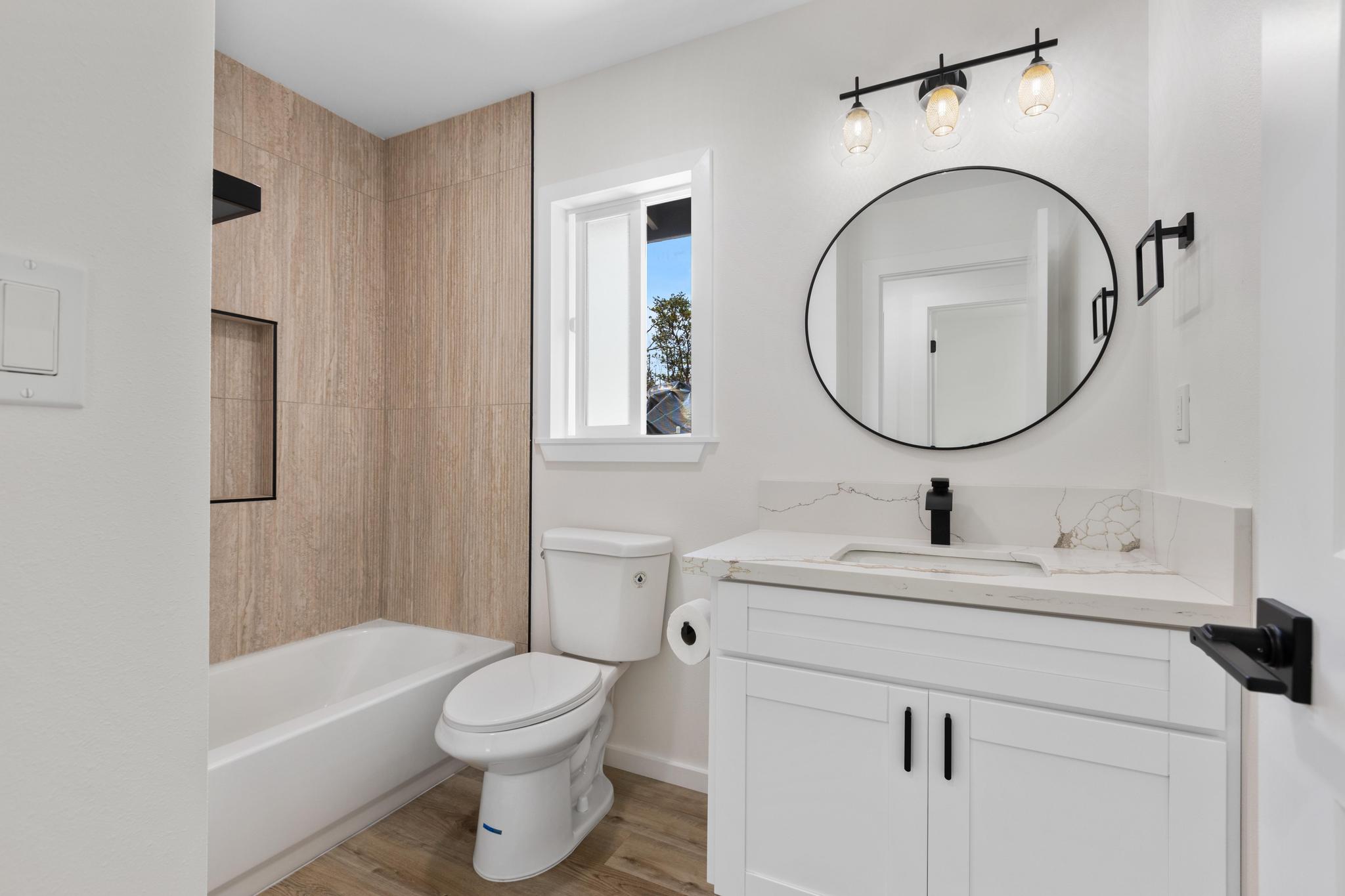 11-3116-a Mokuna Street Mountain View, HI 96771 - Photo 6 of 15 a bathroom with a sink toilet and a mirror