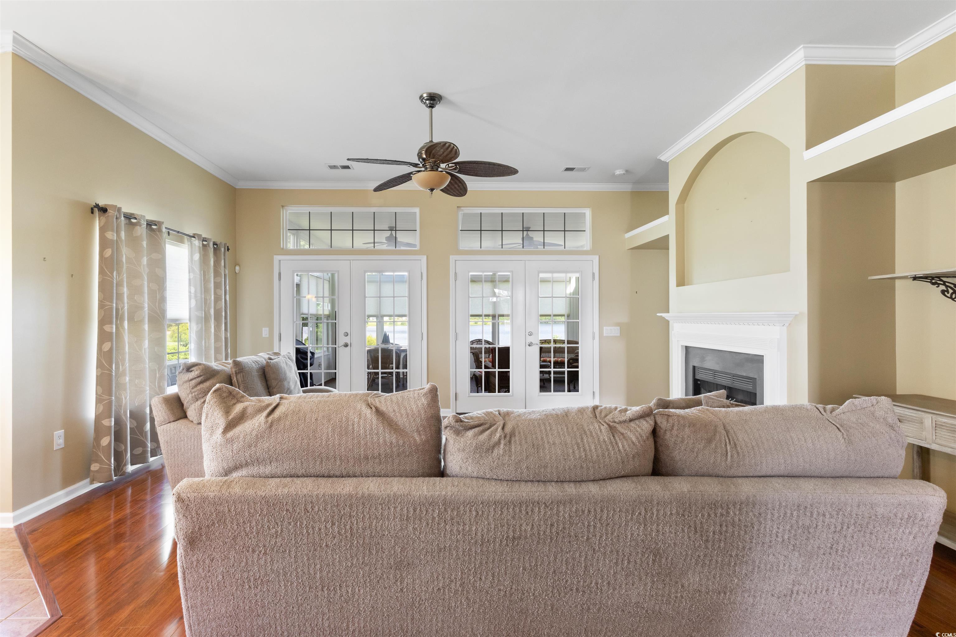 2210 Haystack Way Myrtle Beach, SC 29579 - Photo 12 of 33 Living area featuring crown molding, french doors,