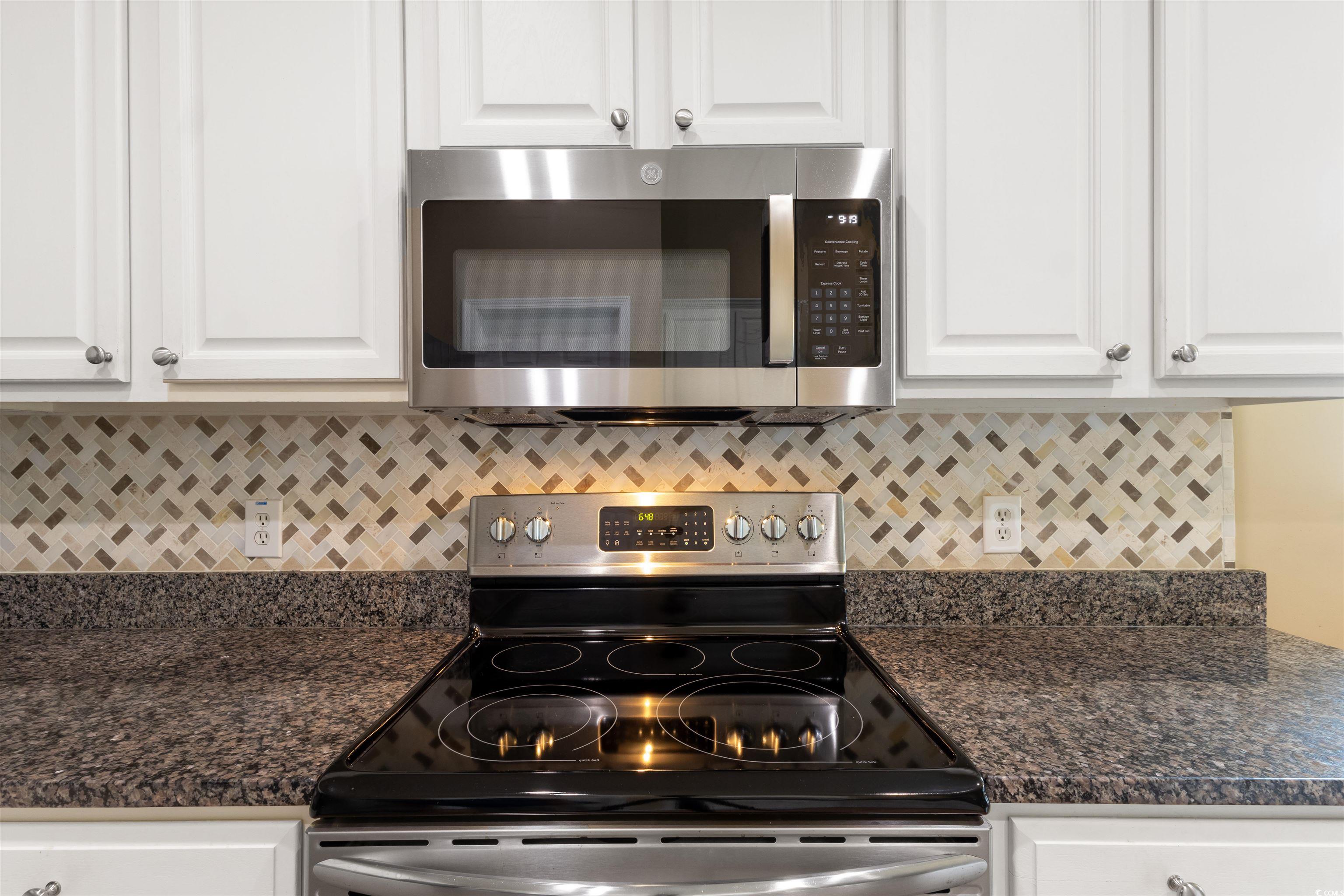 2210 Haystack Way Myrtle Beach, SC 29579 - Photo 15 of 33 Kitchen with stainless steel appliances, white cab