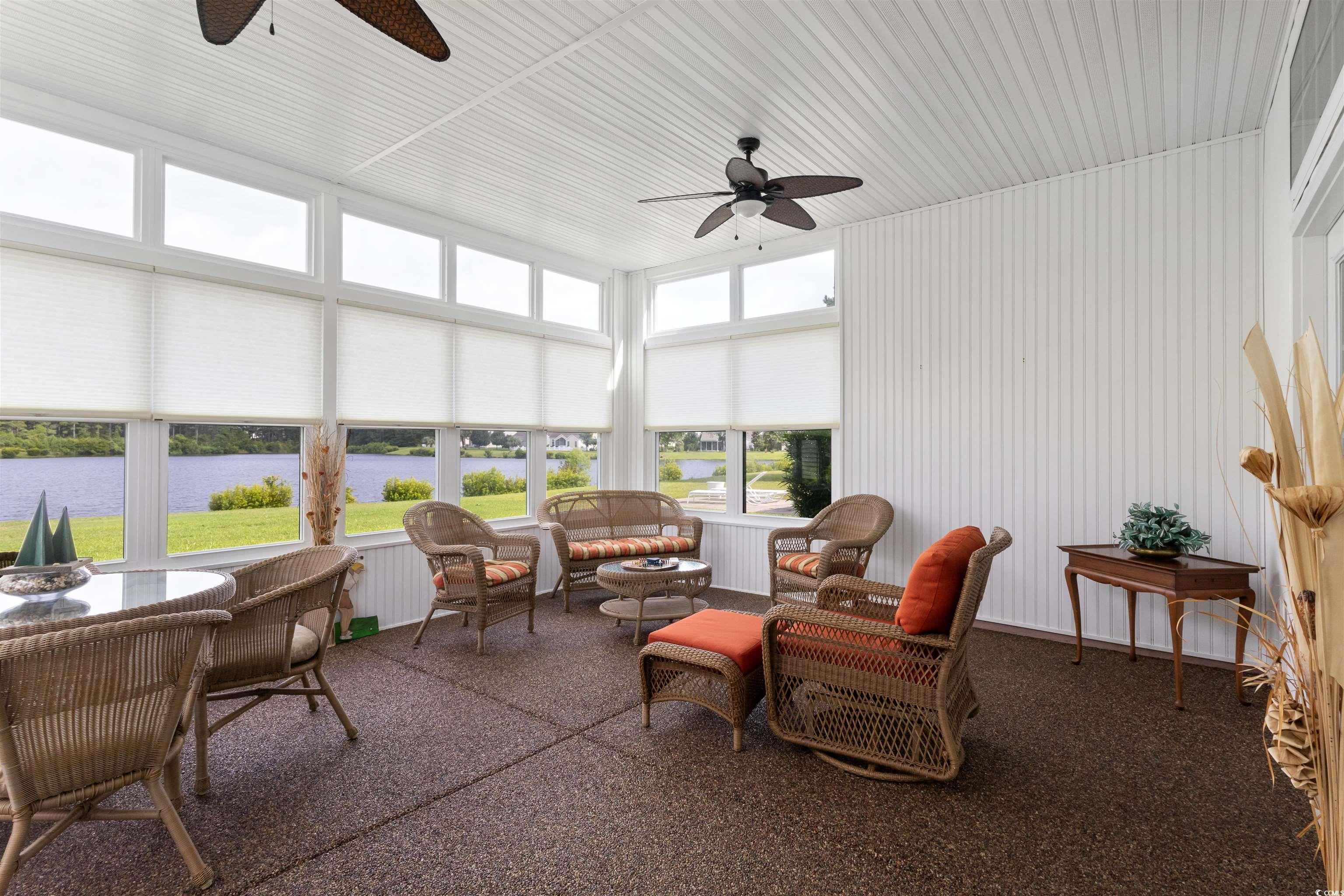 2210 Haystack Way Myrtle Beach, SC 29579 - Photo 19 of 33 Sunroom / solarium featuring a ceiling fan, a wate