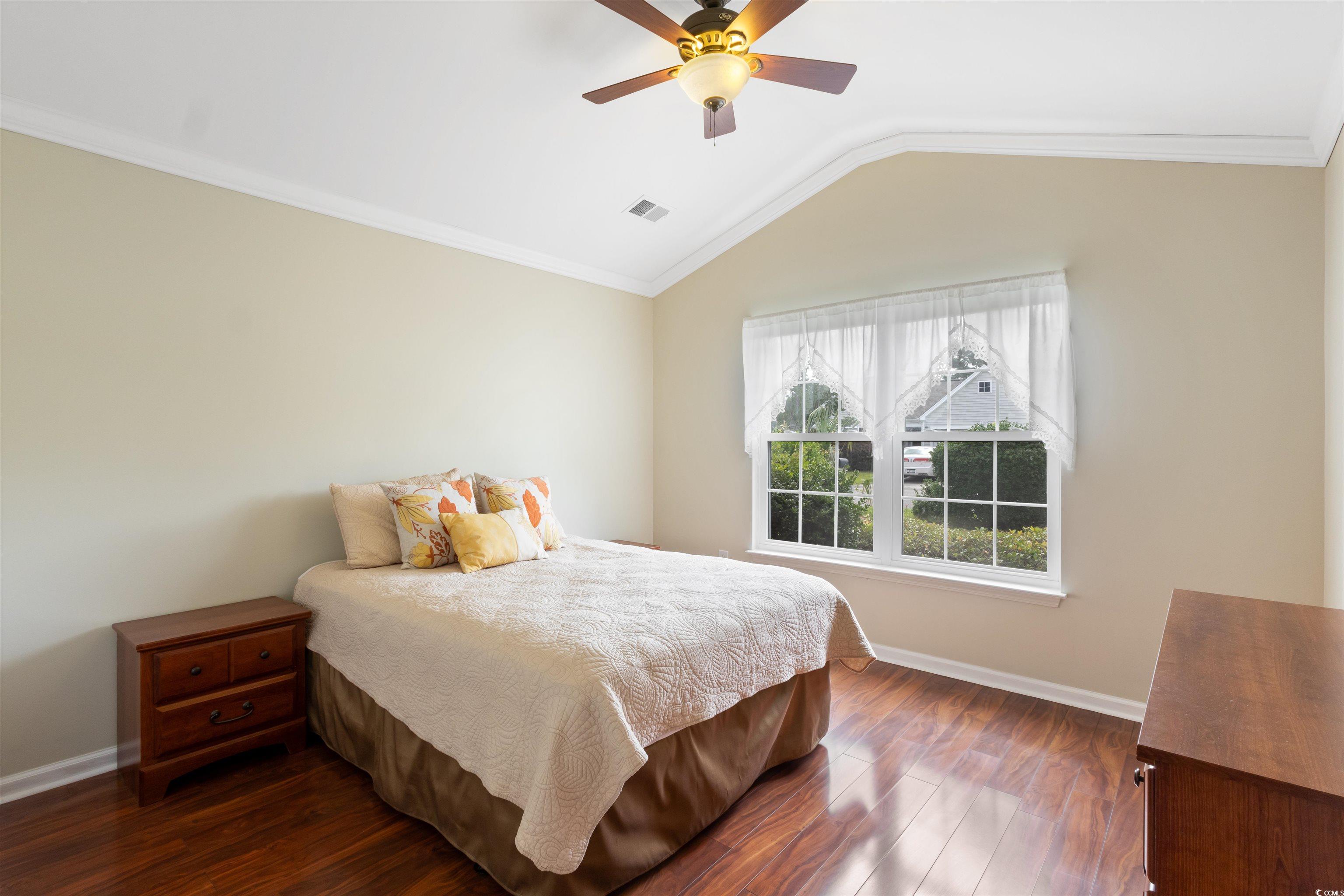 2210 Haystack Way Myrtle Beach, SC 29579 - Photo 22 of 33 Bedroom featuring dark wood-style flooring, vaulte