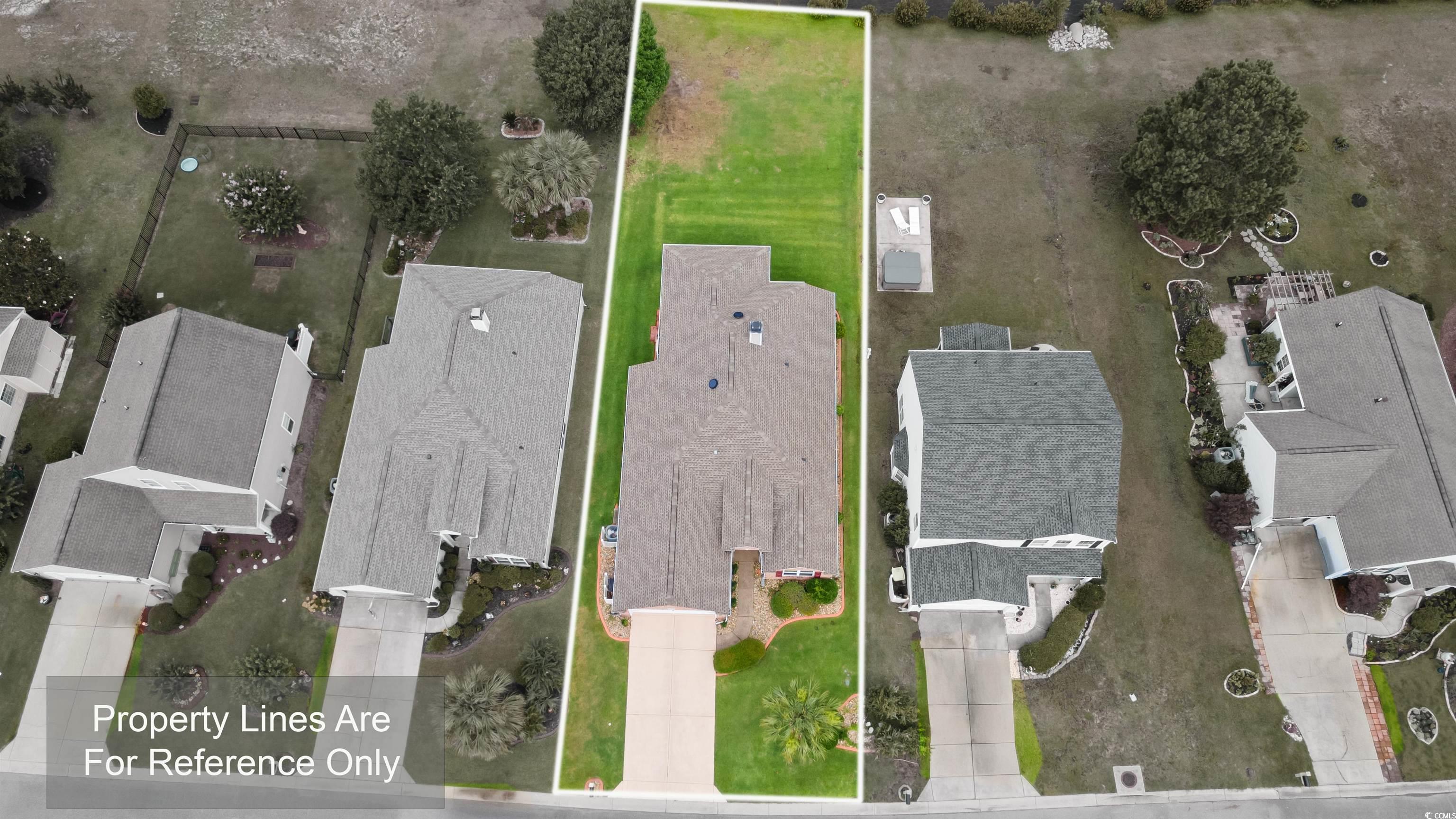 Aerial view of residential area featuring property