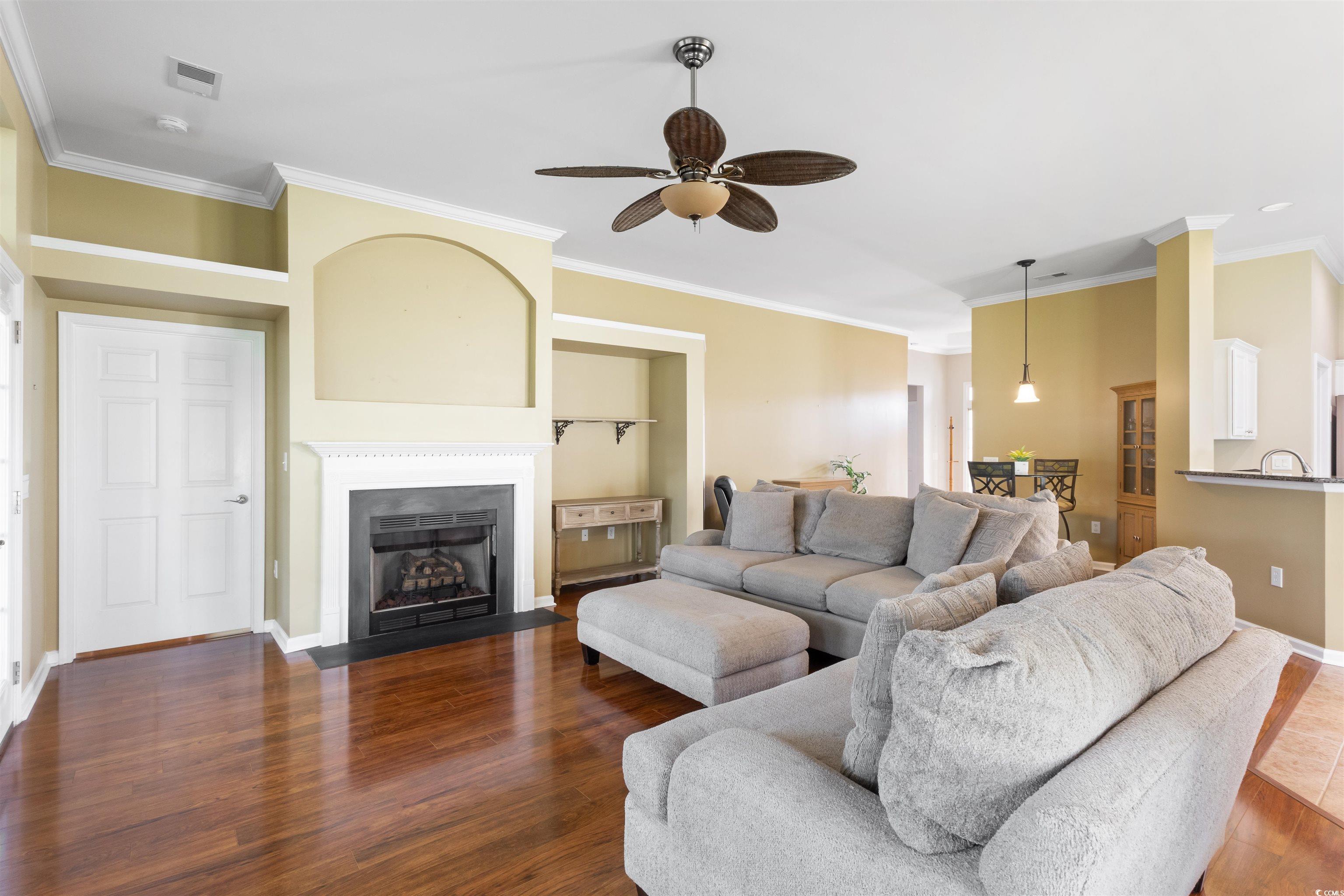 2210 Haystack Way Myrtle Beach, SC 29579 - Photo 9 of 33 Living area featuring a ceiling fan, wood finished