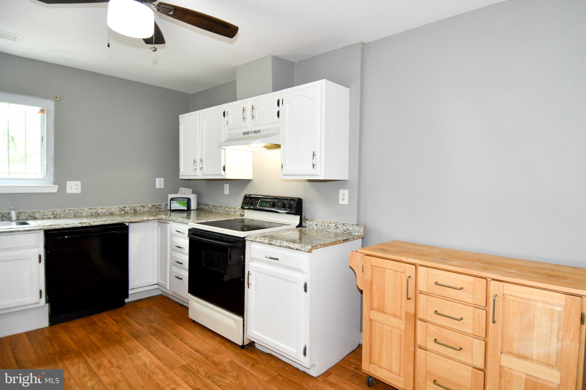 7737 Merrick Lane Landover, MD 20785 - Photo 11 of 34 Modern kitchen with sleek finishes.