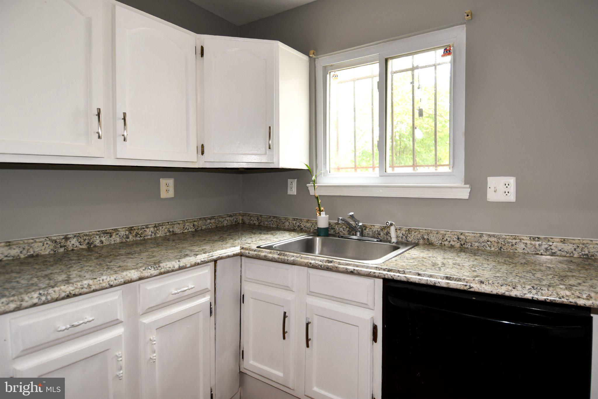7737 Merrick Lane Landover, MD 20785 - Photo 13 of 34 Bright kitchen with modern finishes.
