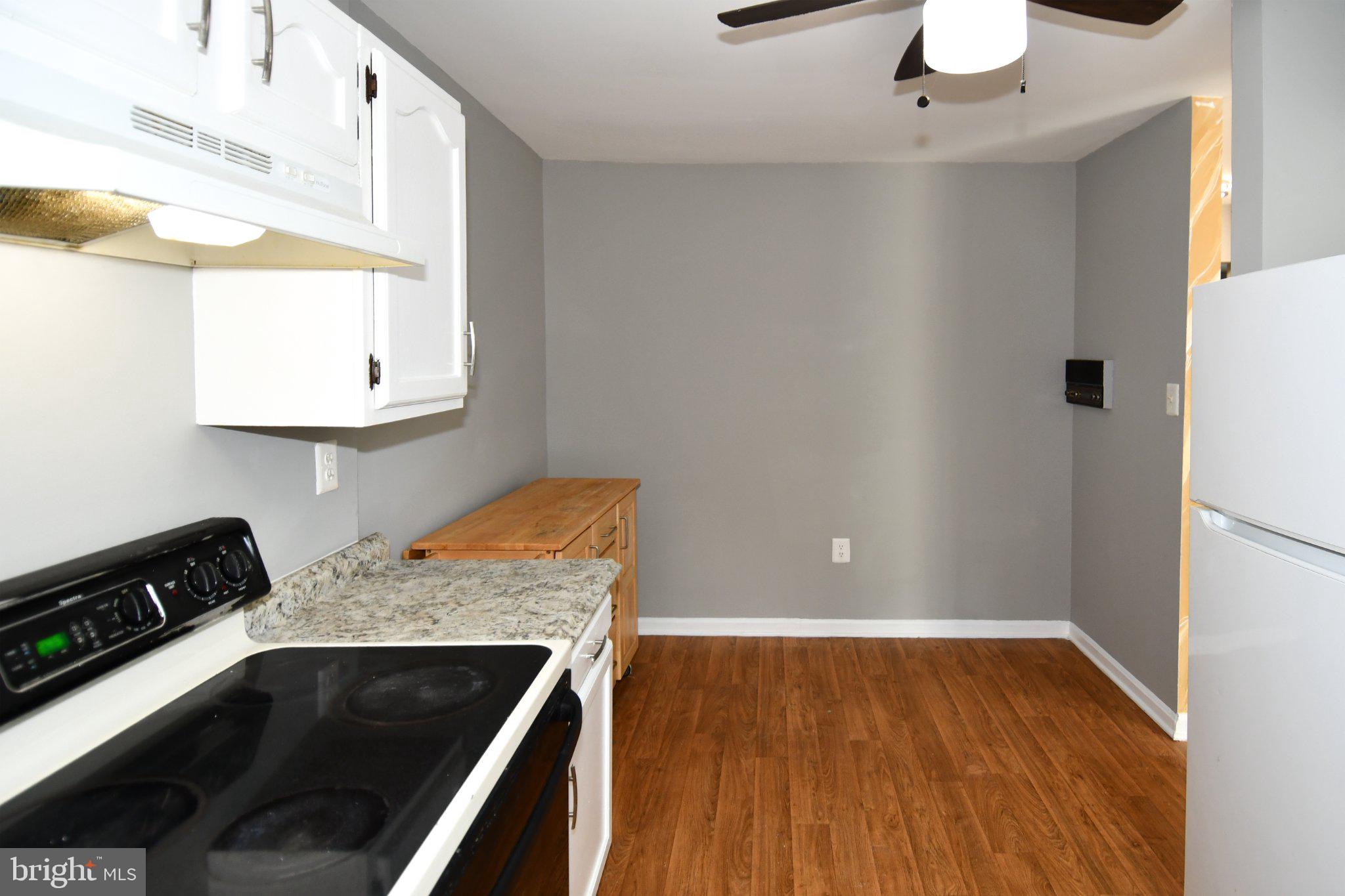 7737 Merrick Lane Landover, MD 20785 - Photo 14 of 34 Modern kitchen with sleek finishes.