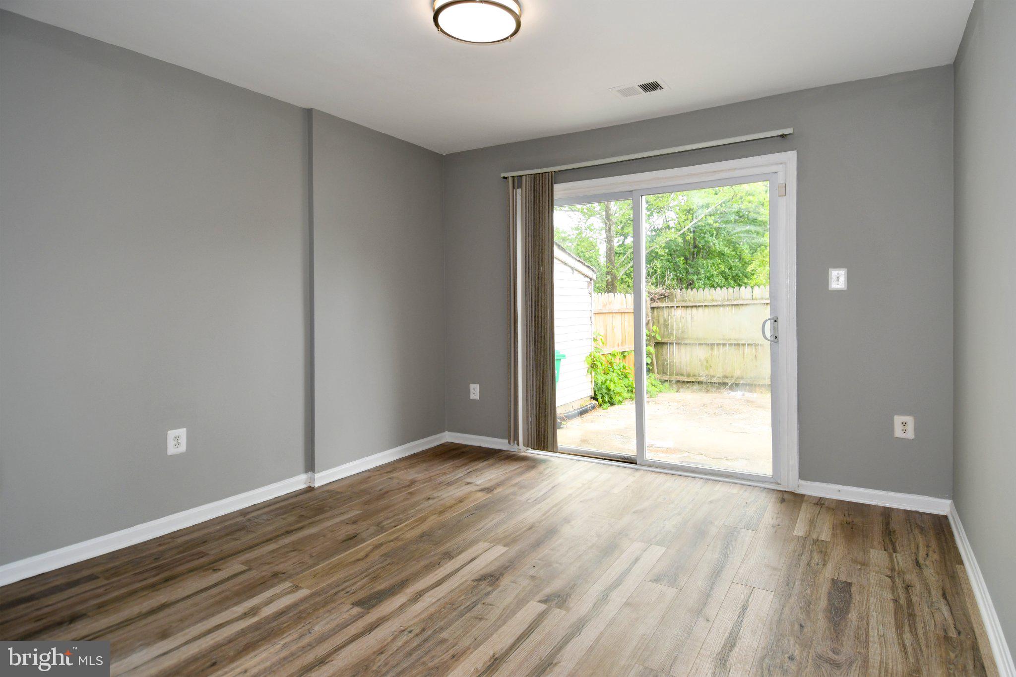 7737 Merrick Lane Landover, MD 20785 - Photo 15 of 34 Bright and airy space with outdoor access.