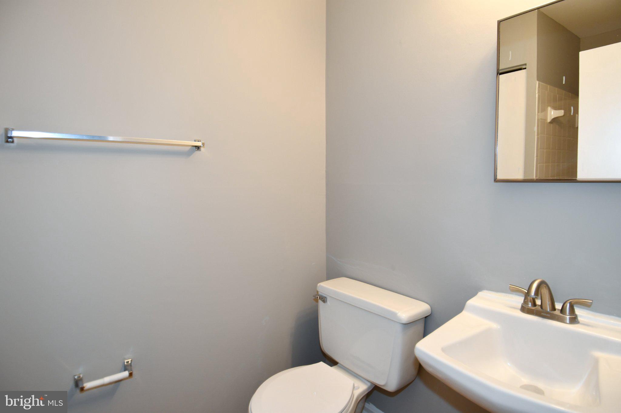 7737 Merrick Lane Landover, MD 20785 - Photo 20 of 34 Modern bathroom with sleek fixtures.