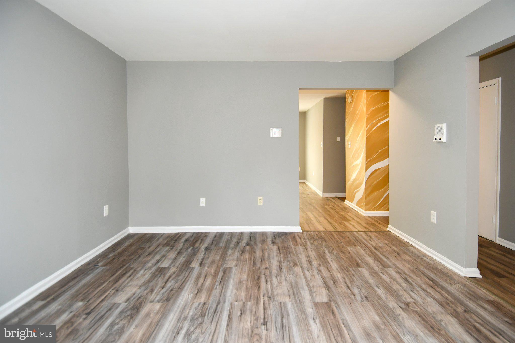 7737 Merrick Lane Landover, MD 20785 - Photo 3 of 34 Spacious, modern living area awaits you.