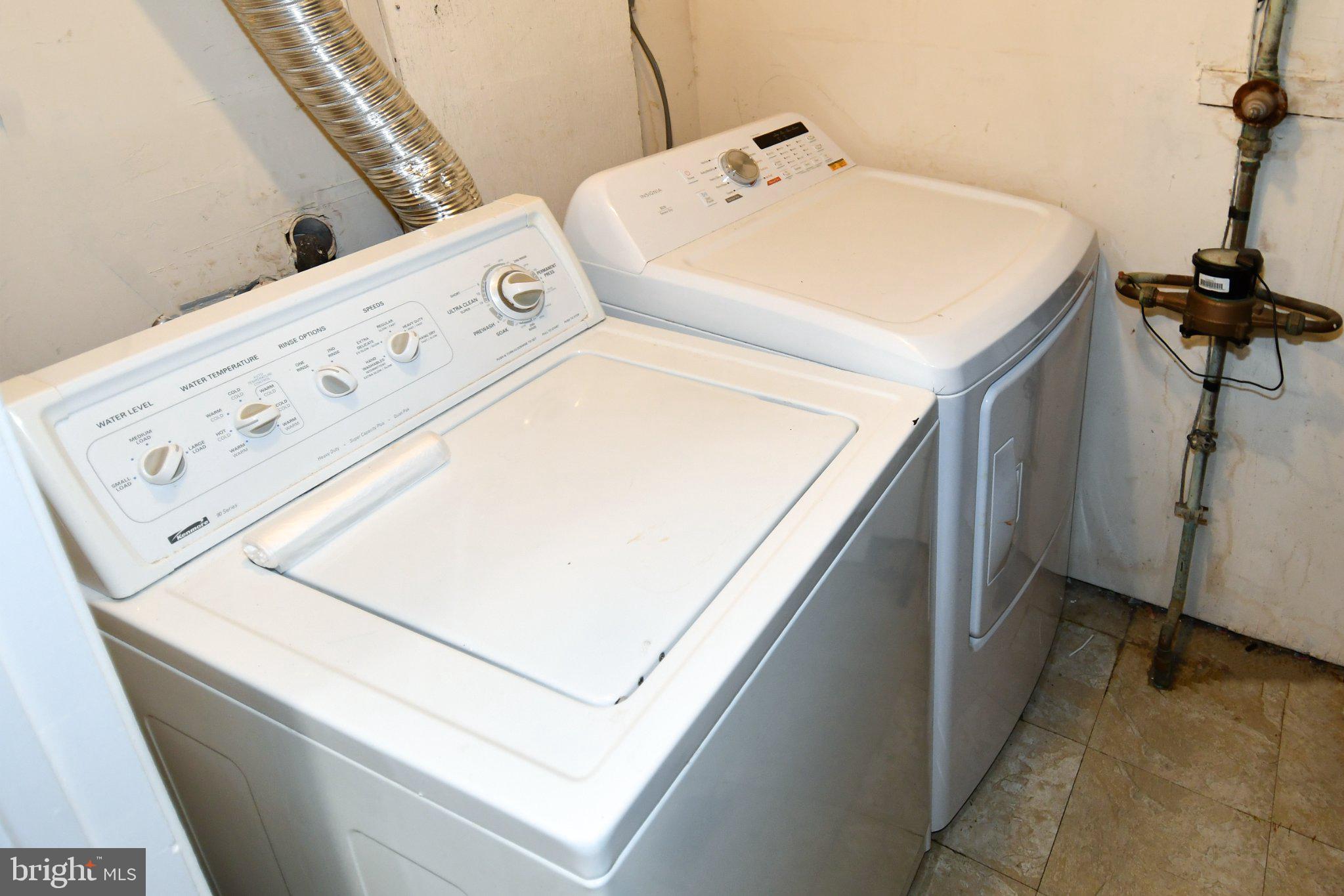7737 Merrick Lane Landover, MD 20785 - Photo 31 of 34 Modern laundry appliances in utility space.