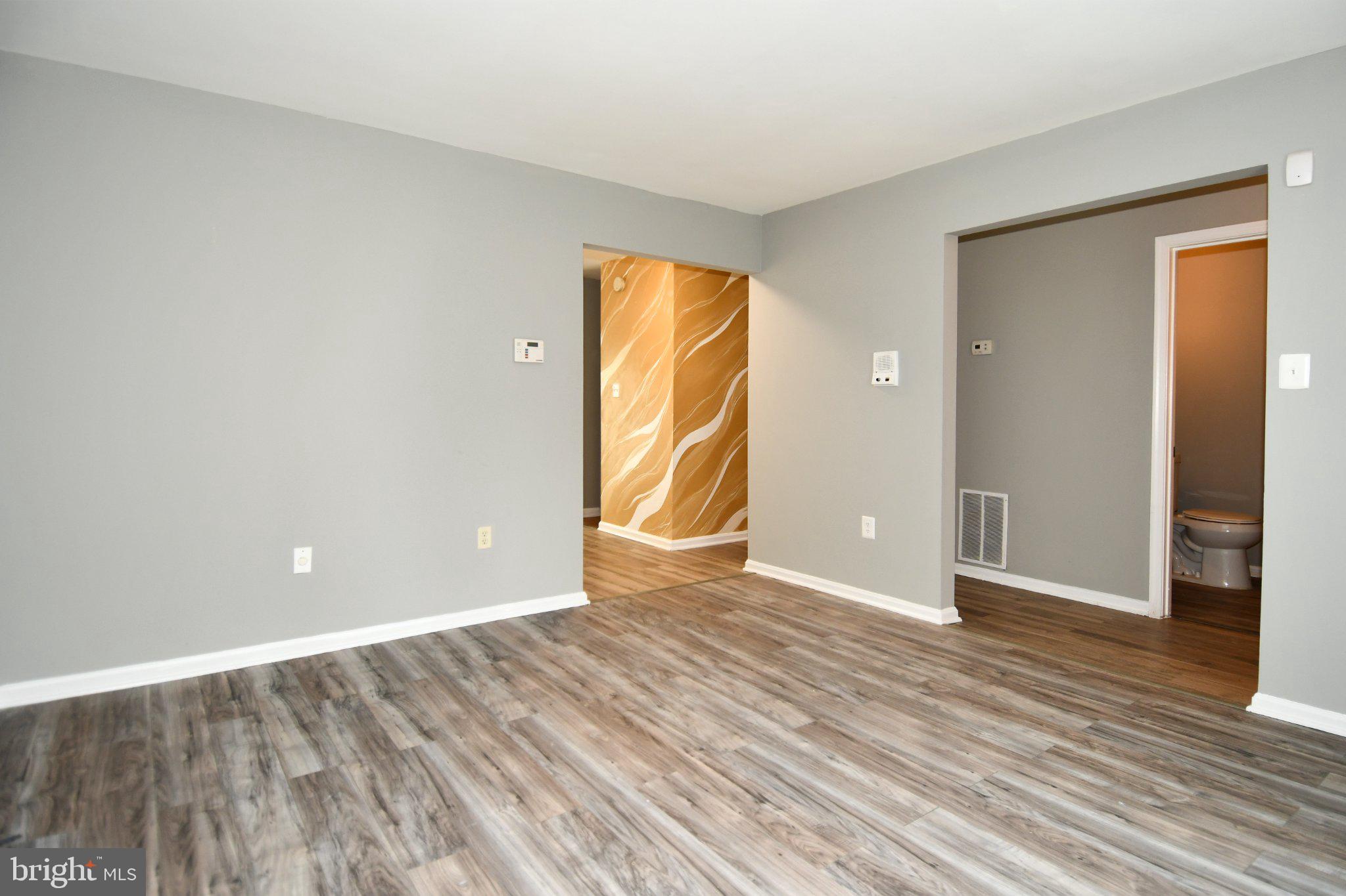 7737 Merrick Lane Landover, MD 20785 - Photo 4 of 34 Spacious, modern living area awaits you.