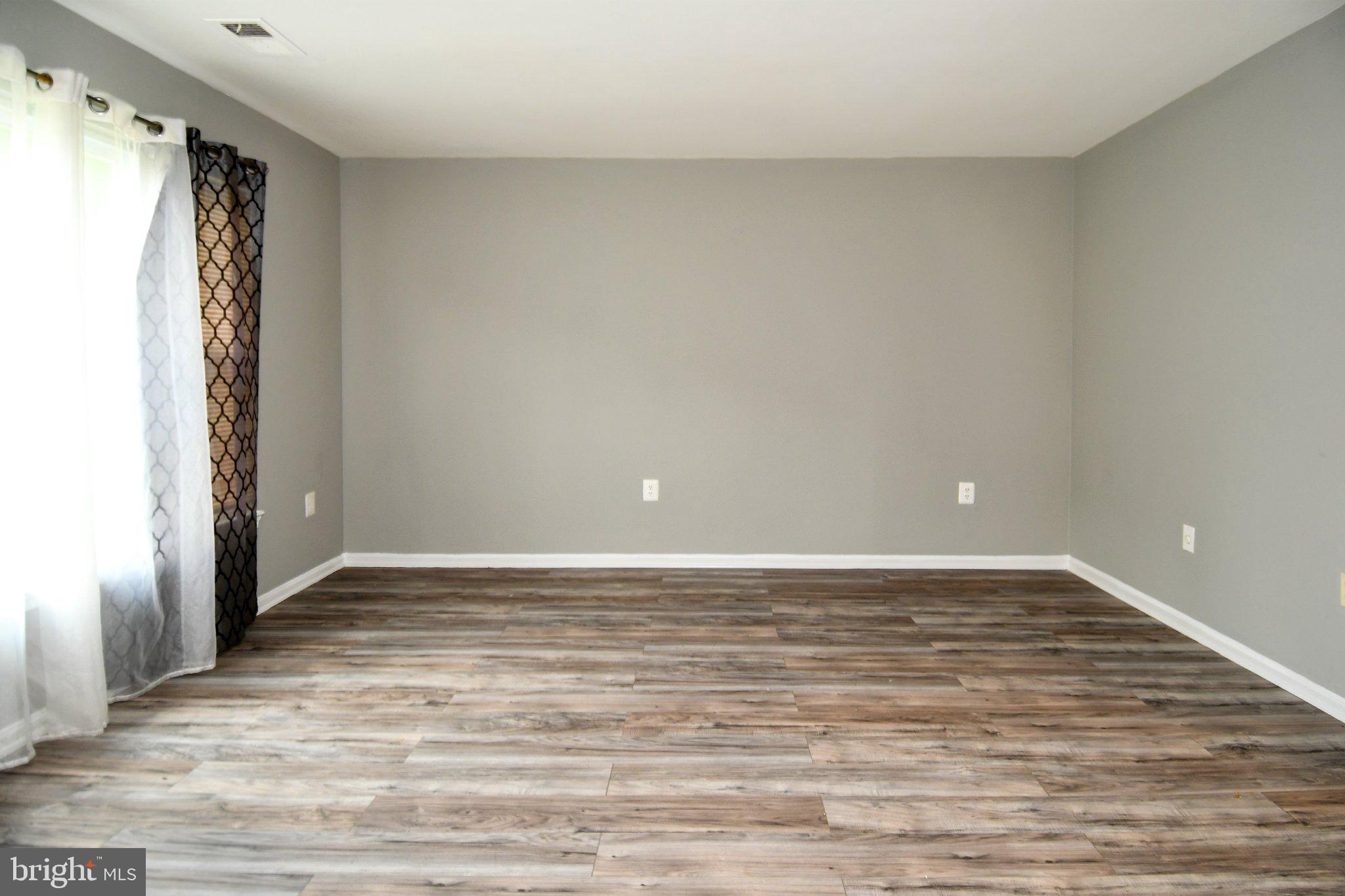 7737 Merrick Lane Landover, MD 20785 - Photo 5 of 34 Spacious room with natural light.