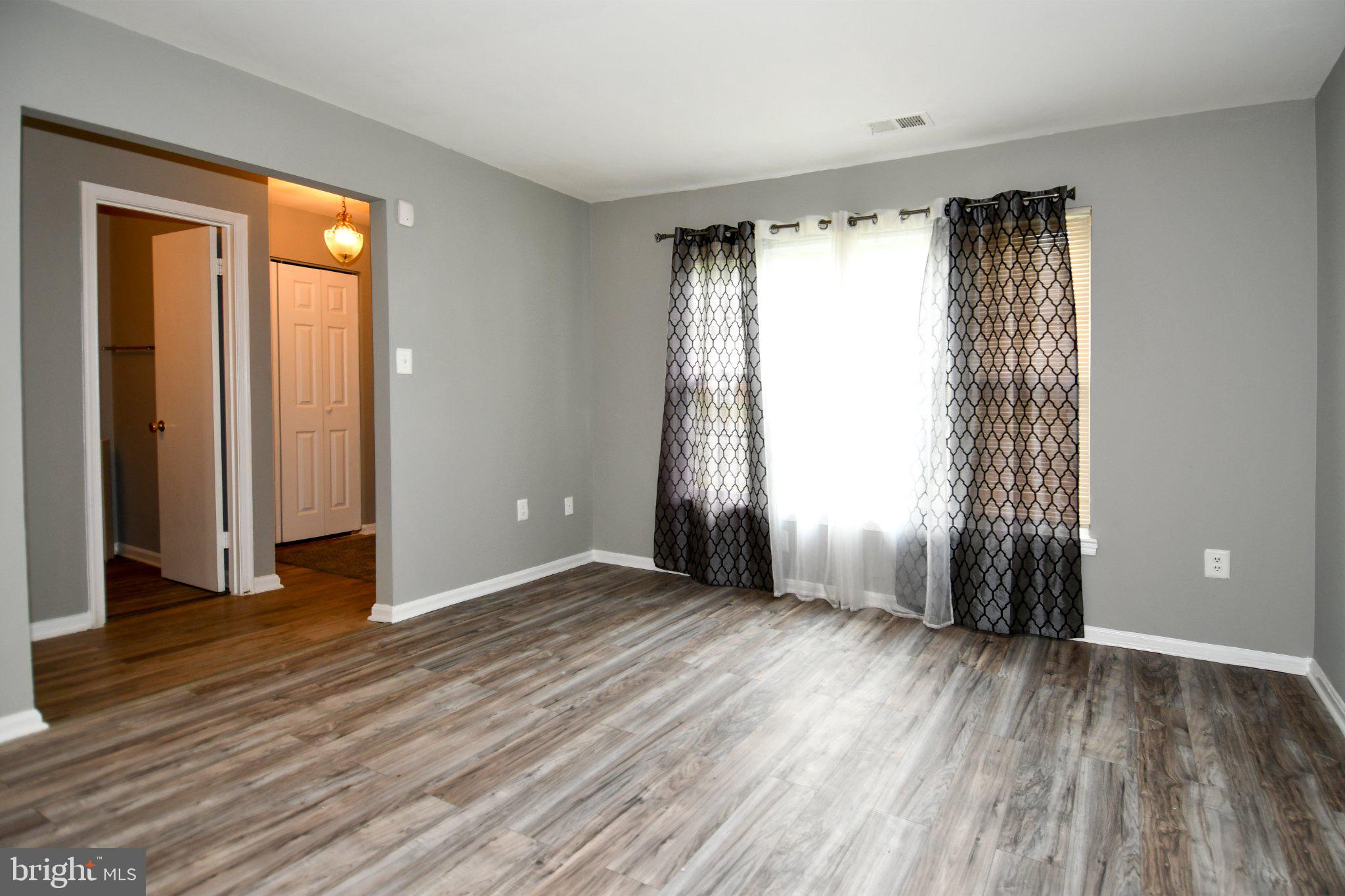 7737 Merrick Lane Landover, MD 20785 - Photo 7 of 34 Bright and airy living space awaits.