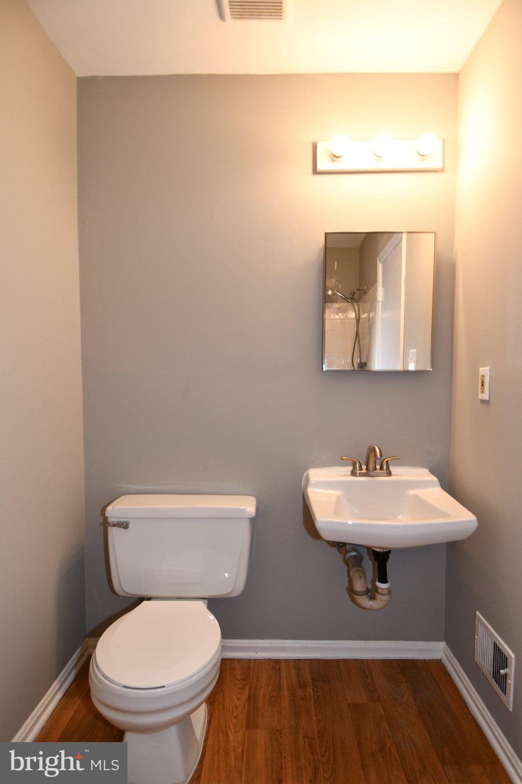 7737 Merrick Lane Landover, MD 20785 - Photo 8 of 34 Sleek and modern half-bath retreat.