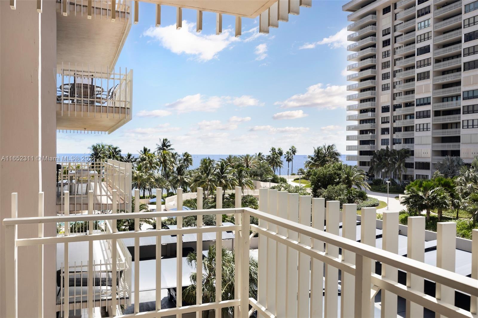 2 Grove Isle Drive, Unit B402 Miami, FL 33133 - Photo 34 of 35 a view of building from balcony