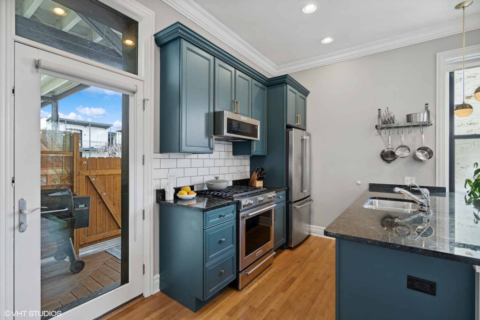 207 West St Paul Avenue, Unit 3W Chicago, IL 60614 - Photo 4 of 15 a kitchen with stainless steel appliances granite countertop a sink stove and refrigerator