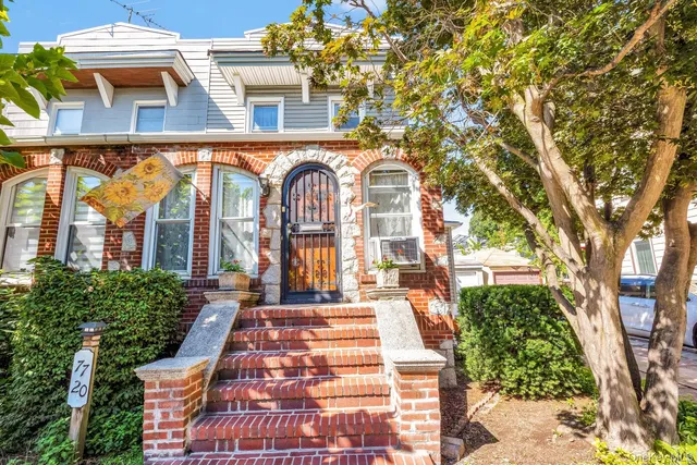 front view of house with a yard